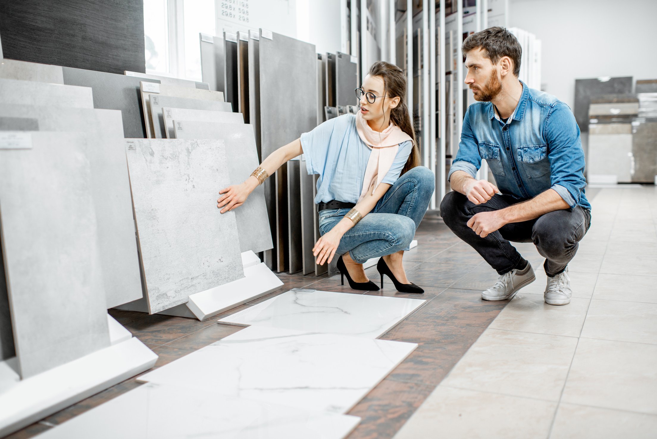 Couple Choosing Tiles in the Shop